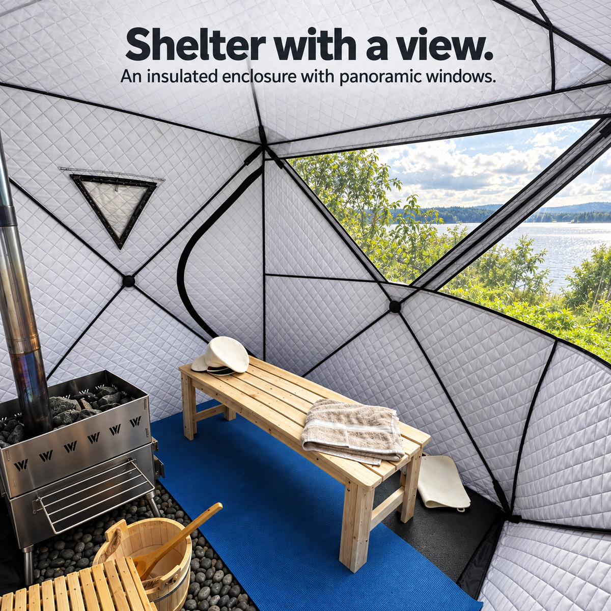 Willowybe insulated sauna tent interior shown with a stove, bench and sauna accessories beside panoramic windows overlooking a lake