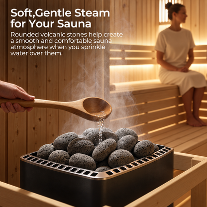 Wooden ladle pouring water onto rounded Willowybe sauna stones in a heater, with rising steam and a seated sauna user in the background